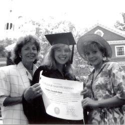 Kirsten Gillibrand in a graduation cap and gown with her grandmother and mother